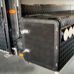 Caravan with Storage box mounted at the rear of the van